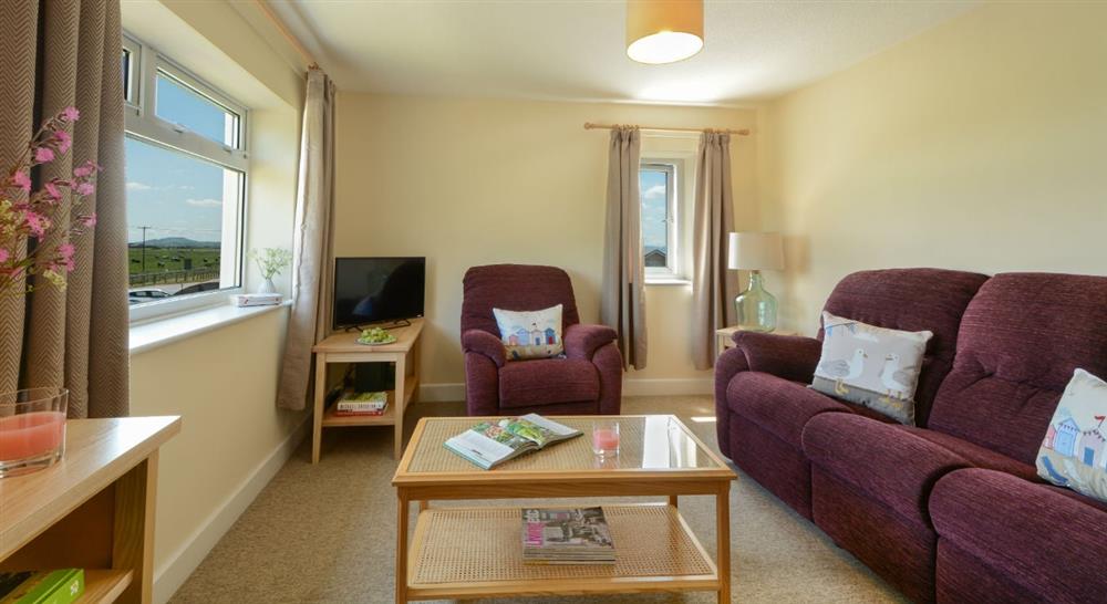 The cosy sitting room at Brean Cove Apartment in Brean, Somerset