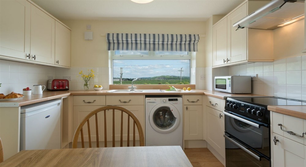 The spacious kitchen at Brean Cove Apartment in Brean, Somerset