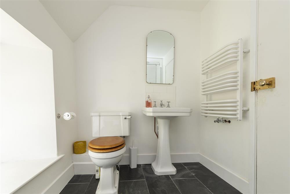 Family bathroom with bath and shower over at Brew House Cottage, Clifton Maybank, nr Sherborne