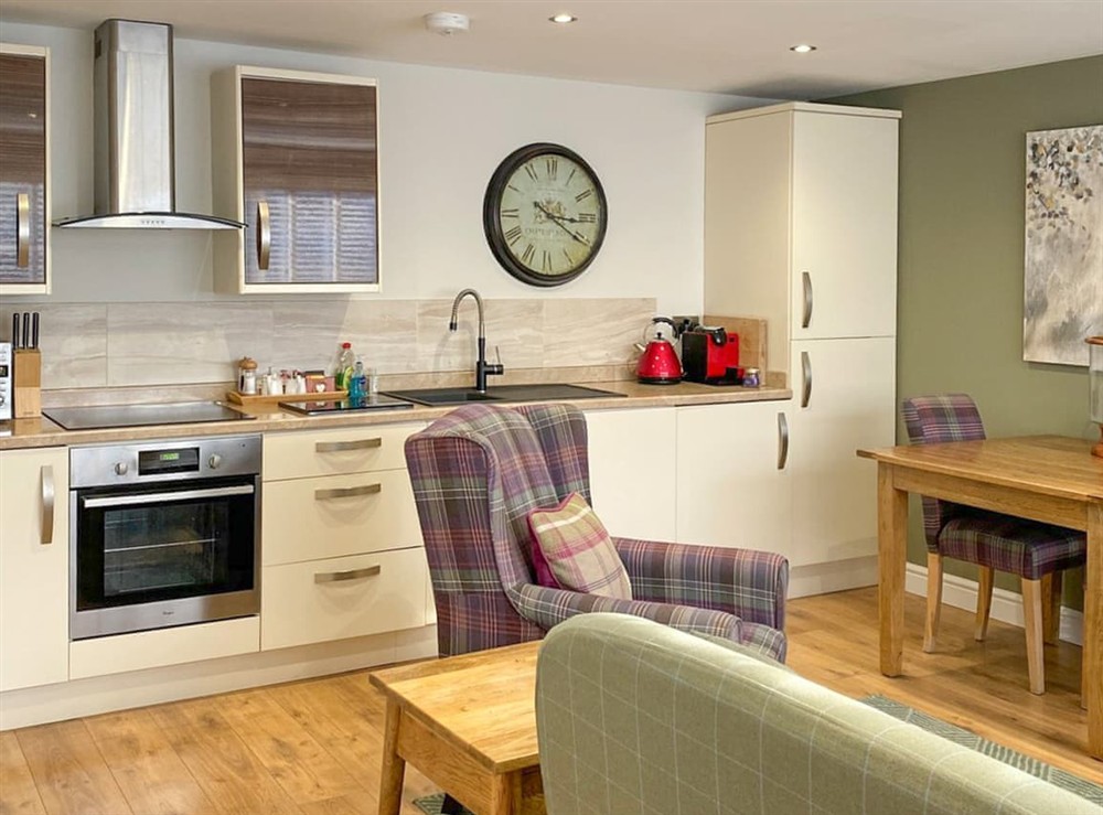 Open plan living space at Brewers Cottage in Foolow, near Hope Valley, Derbyshire