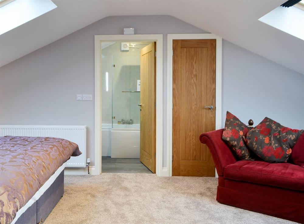 Bedroom with zip and link super kingsize bed (photo 5) at Brewers Cottage in Near Hexham, Northumberland