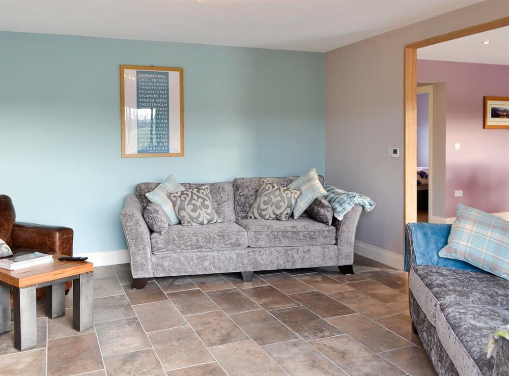 Cosy living area with wood pellet burner (photo 2) at Brewers Cottage in Near Hexham, Northumberland