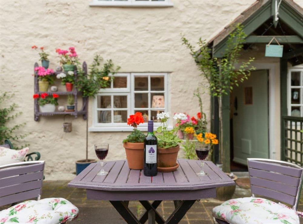 Outdoor furniture in rear courtyard at Brewery House Cottage in Bishop Middleham, near Durham, England