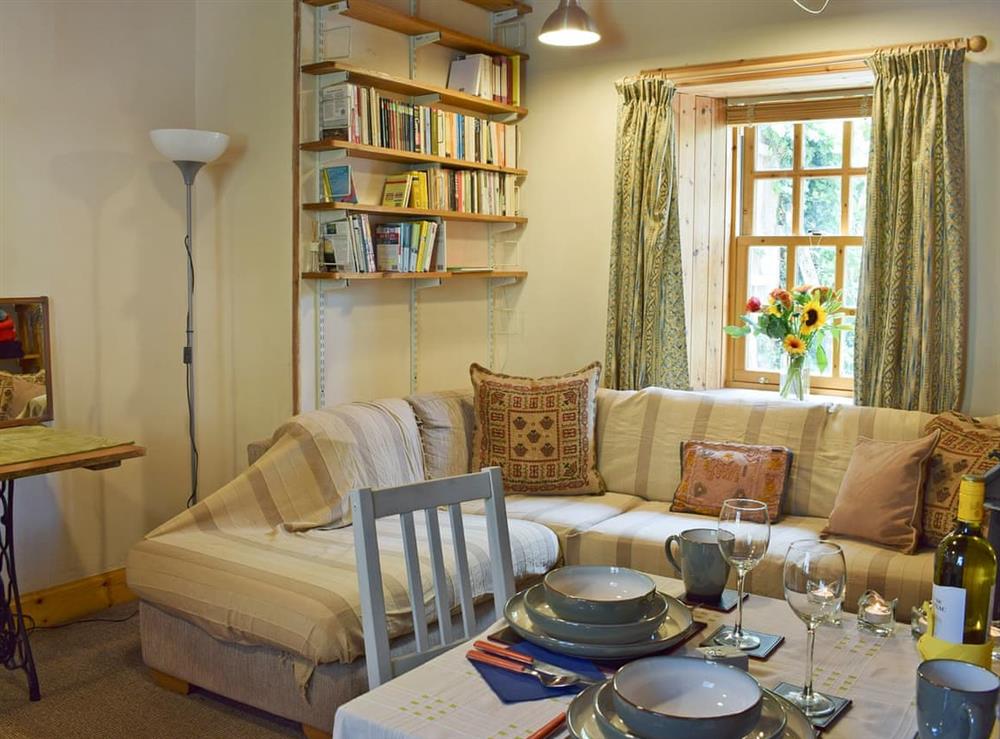 Cosy living/dining room at Brewery Lane in Belhaven, near Dunbar, East Lothian
