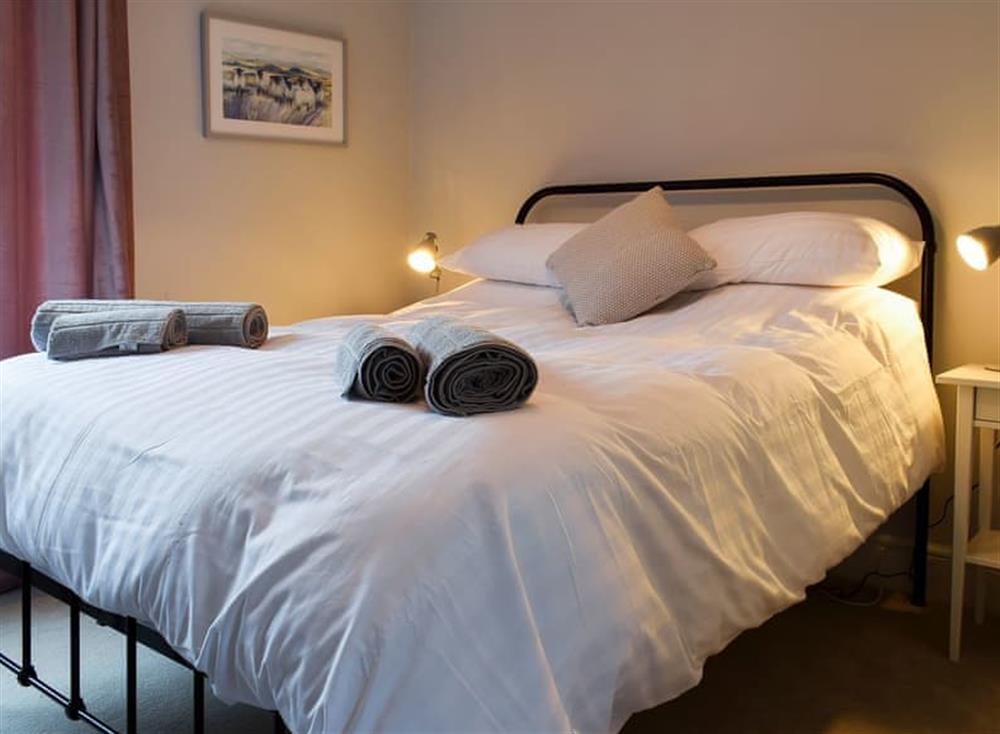 Comfortable bedroom with kingsize bed at Briar Cottage in Prinsted, near Emsworth, West Sussex