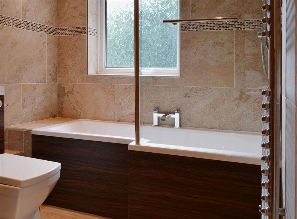 Bathroom with shower over the bath at Briar Rigg in Keswick, Cumbria