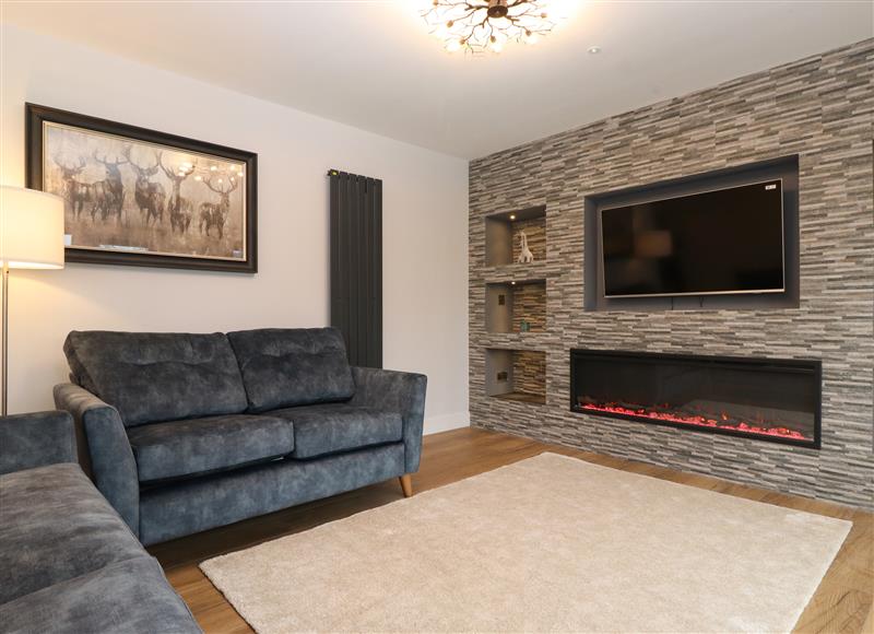 Relax in the living area at Briars Lea, Bowness-On-Windermere