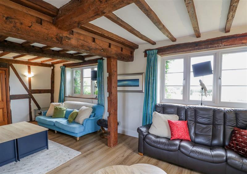 Enjoy the living room at Brickbarns Farm House, Egdon near Peopleton