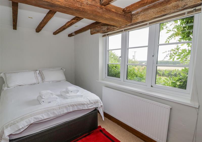 This is a bedroom at Brickbarns Farm House, Egdon near Peopleton
