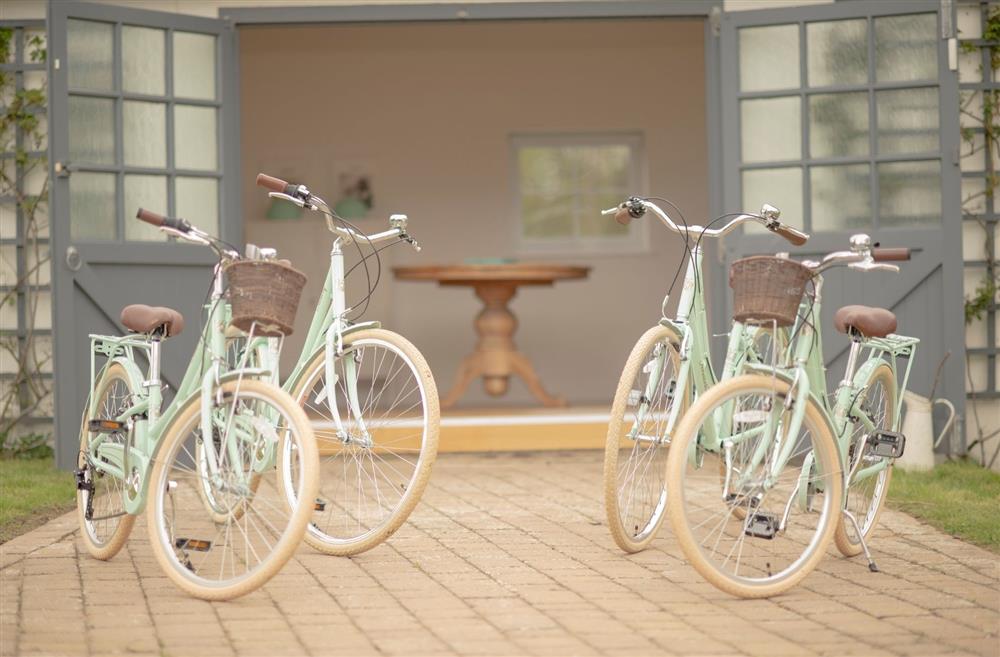 Four bikes outside of the cottage