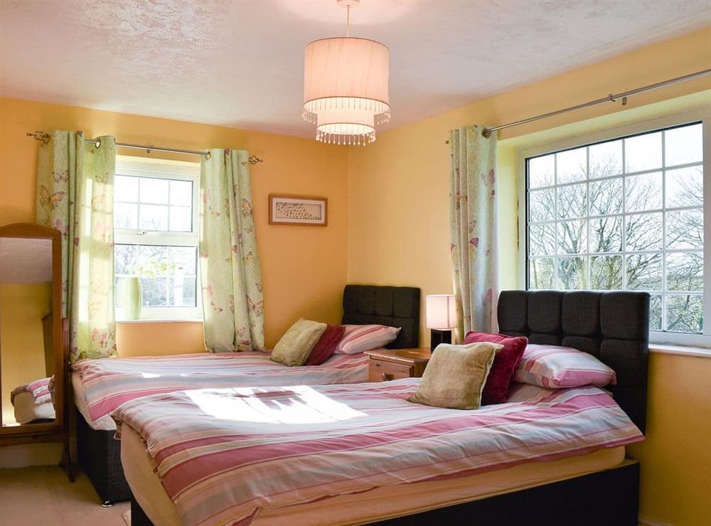 Twin bedroom at Bridge Cottage in Lanjeth, near St Austell, Cornwall