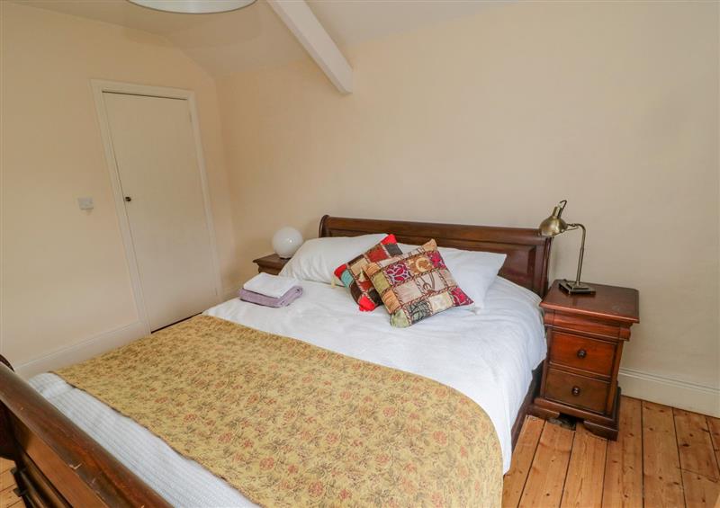 A bedroom in Bridge End Cottage at Bridge End Cottage, Thropton near Rothbury