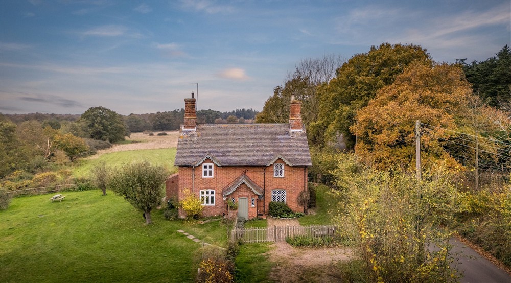 The exterior of Bridge Farm Cottage, a semi-detatched cottage, Suffolk