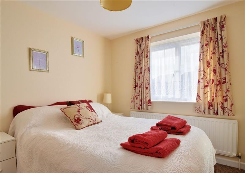 This is a bedroom at Bridge House Apartment, Charmouth