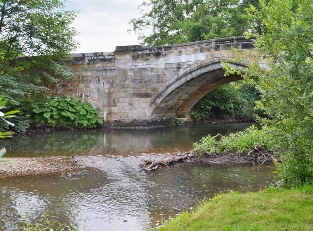 River adjacent to cottage at Bridge House in Helmsley, N. Yorkshire., North Yorkshire