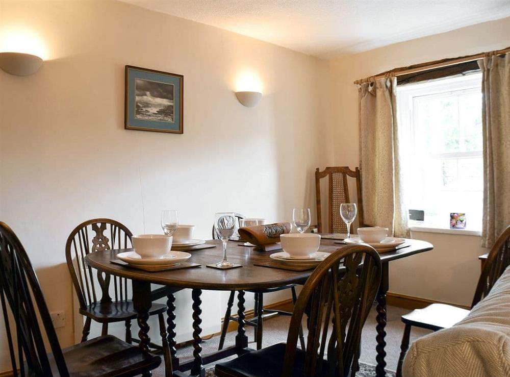Charming dining area at Bridge House in Keswick, Cumbria