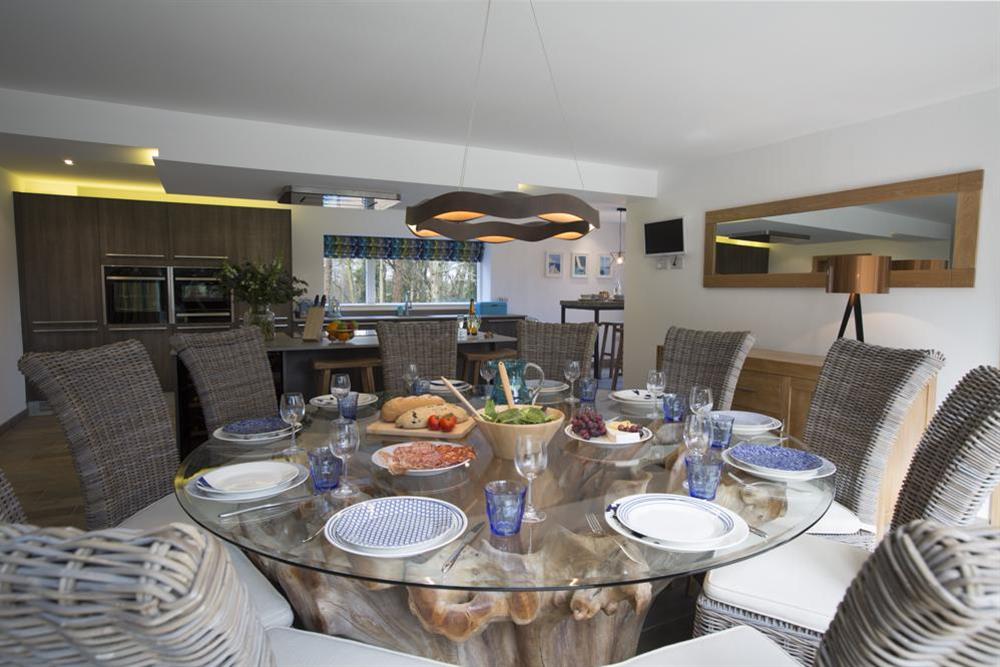 Beautiful glass dining table seating 10 guests comfortably (photo 3) at Bridleway House in , Salcombe