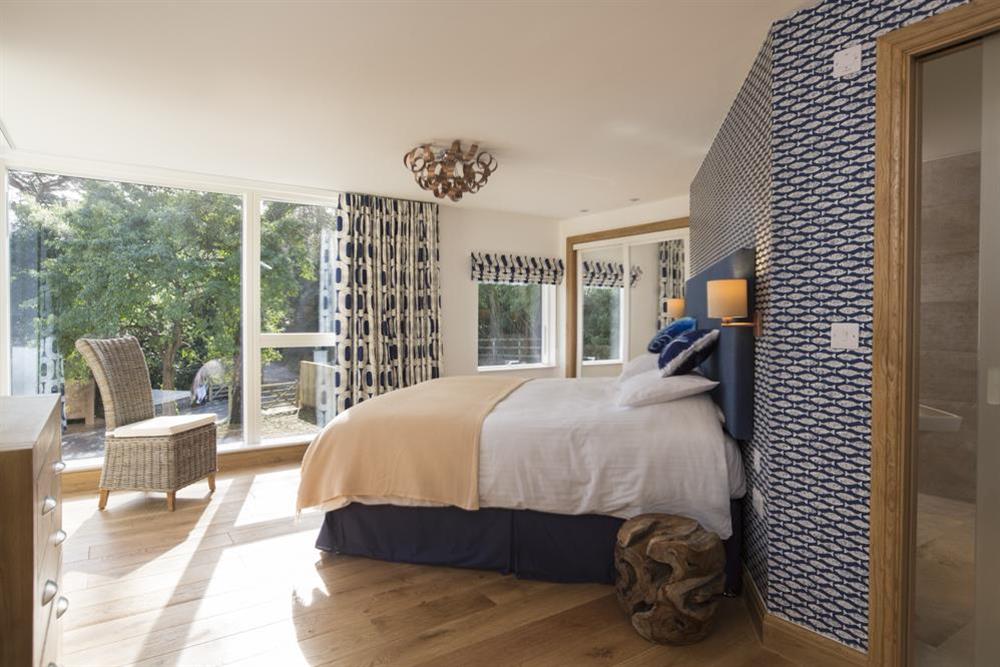 En suite first floor bedroom with super-King size bed at Bridleway House in , Salcombe