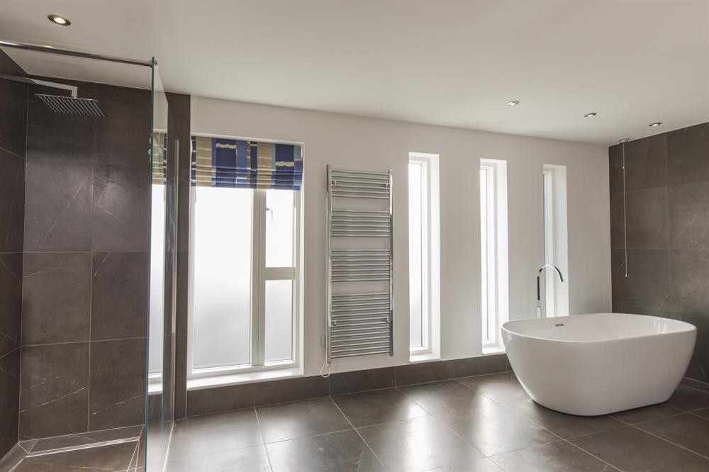 Stunning master en suite with freestanding bath and walk-in shower (photo 2) at Bridleway House in , Salcombe