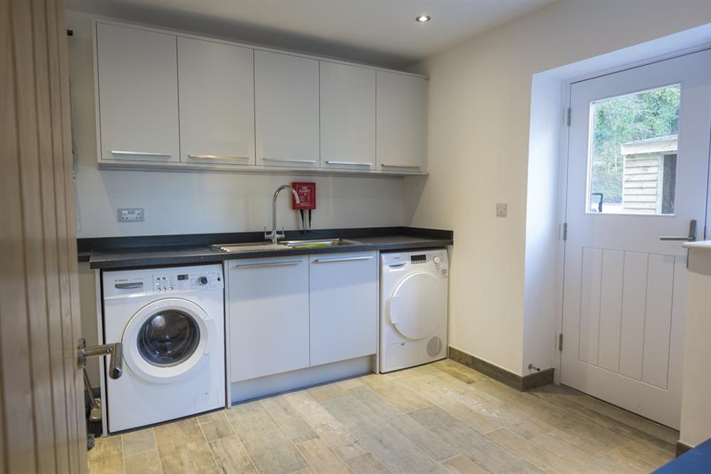 Utility room with Bosch washing machine and tumble dryer