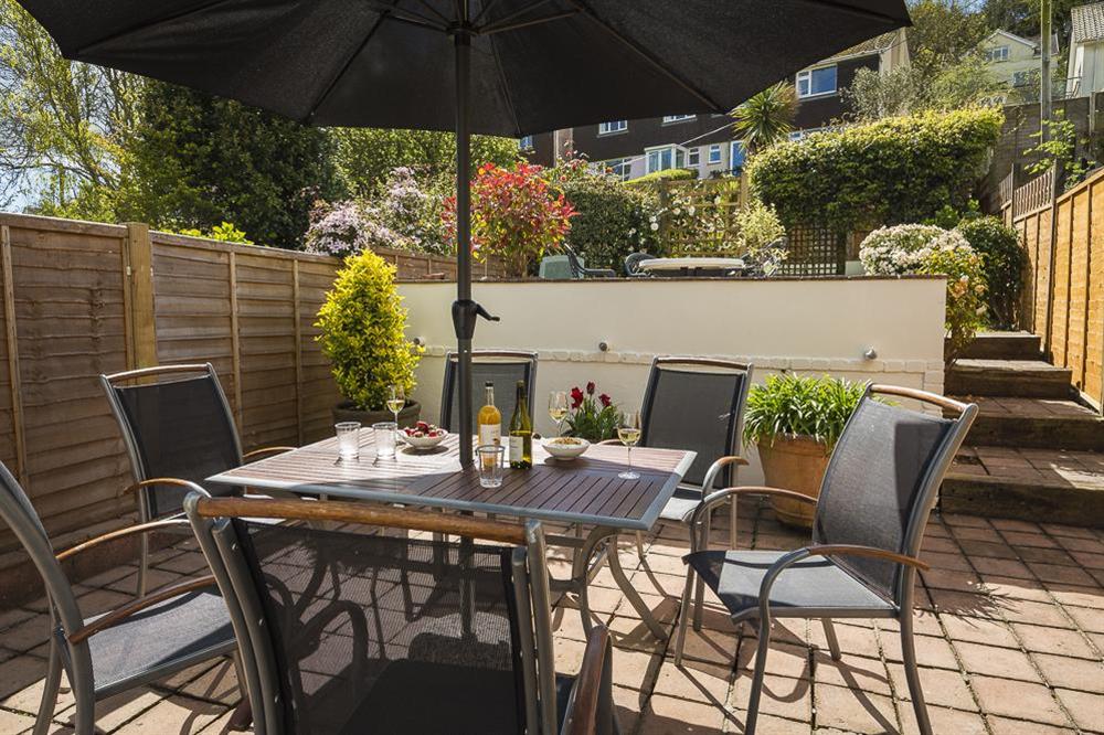 Lower terrace area with garden table, chairs and barbecue (photo 2) at Brierdene in , Salcombe