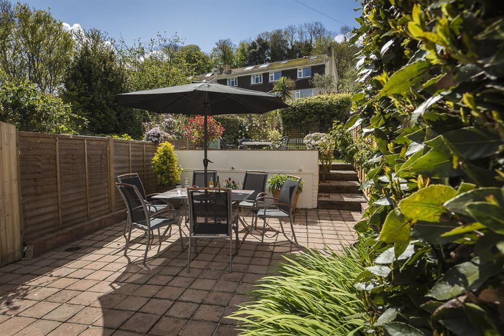 Lower terrace area with garden table, chairs and barbecue (photo 3) at Brierdene in , Salcombe