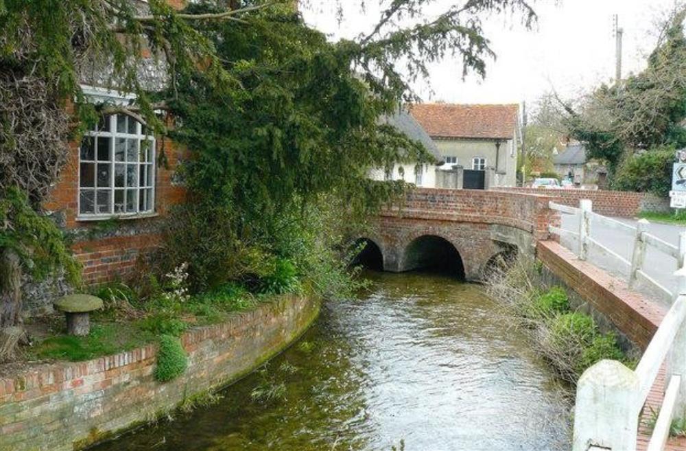 The village with a river running through near