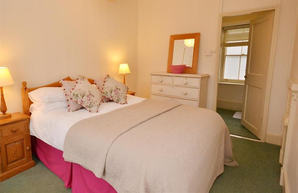 The double bedroom.with views over the garden and village at Britannia Cottage, Stoke Fleming