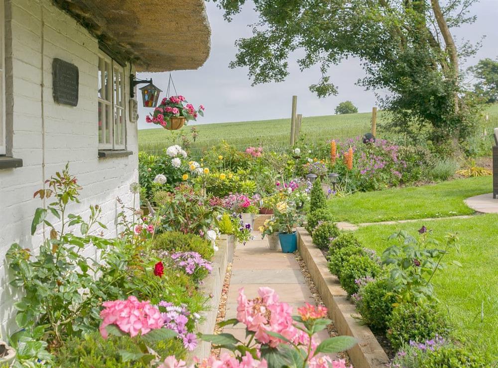 Beautiful garden areas at Brittons Hill Cottage in Kenardington, near Ashford, Kent