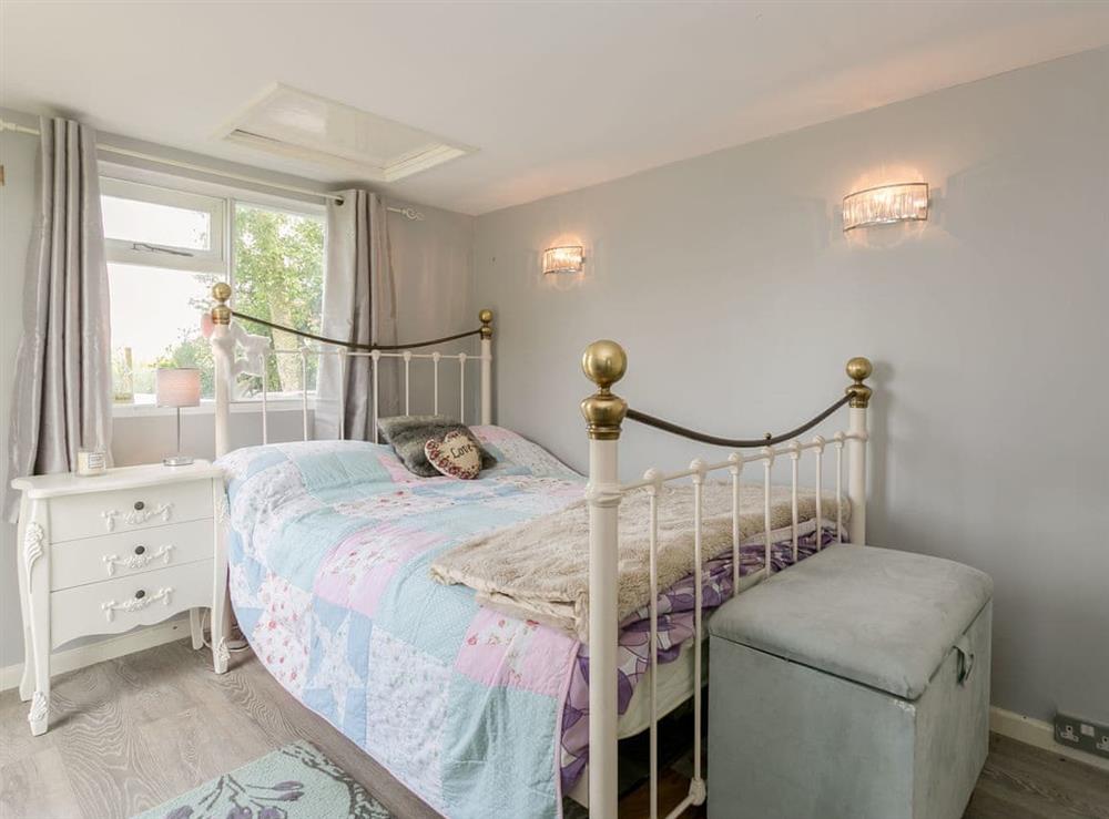 Comfortable double bed within annexe at Brittons Hill Cottage in Kenardington, near Ashford, Kent