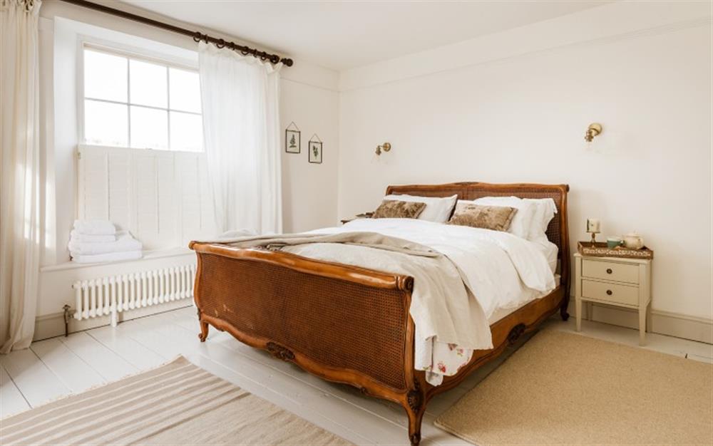 Master bedroom at Broad Down Farmhouse in Malborough