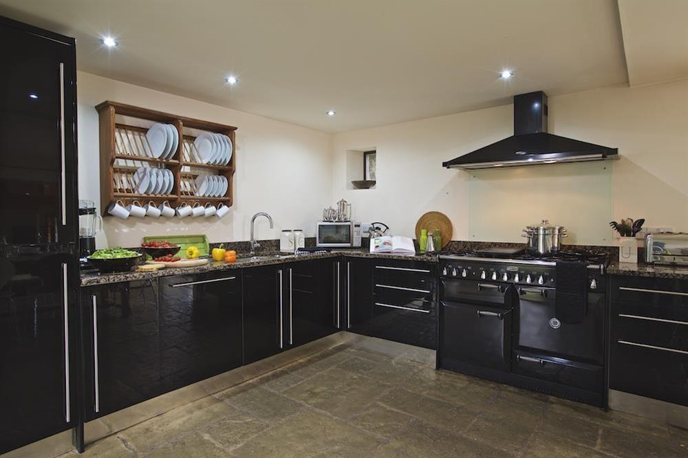 Modern, very well equipped kitchen at Broad Downs Barn in Malborough, Nr Salcombe