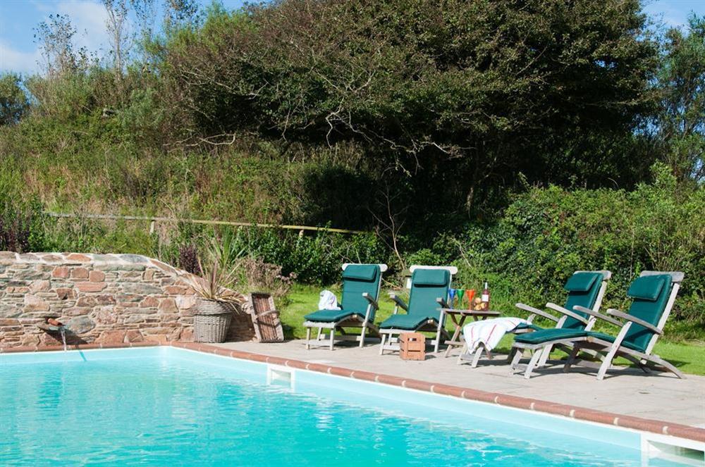 Outdoor heated swimming pool set in original walled garden (shared with the owner's farmhouse) (photo 2) at Broad Downs Barn in Malborough, Nr Salcombe