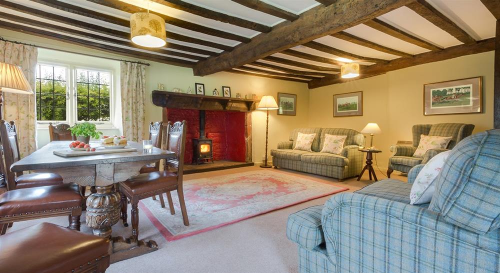 The sitting and dining room at Broad Ley Cottage in Exeter, Devon