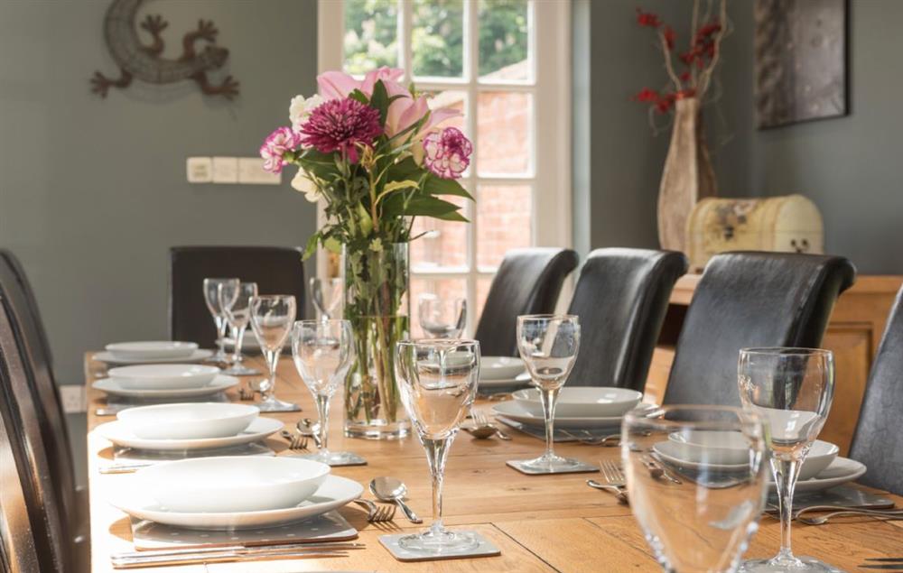 The elegant dining table seating twelve guests at Broad Meadows Farmhouse, Bayton