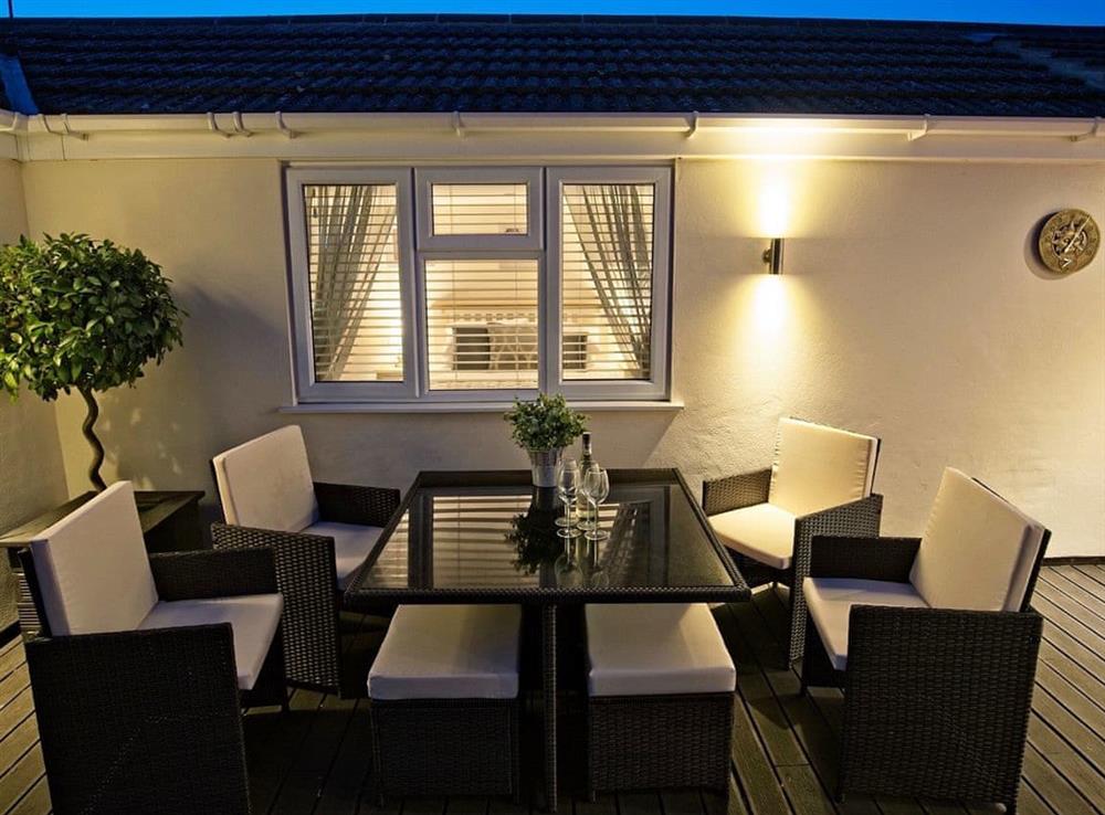Relaxing sitting-out-area at night at Broadland Hideaway in Martham, near Great Yarmouth, Norfolk