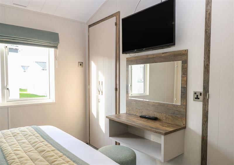 The living room at Broadland Sands Lodge, Corton