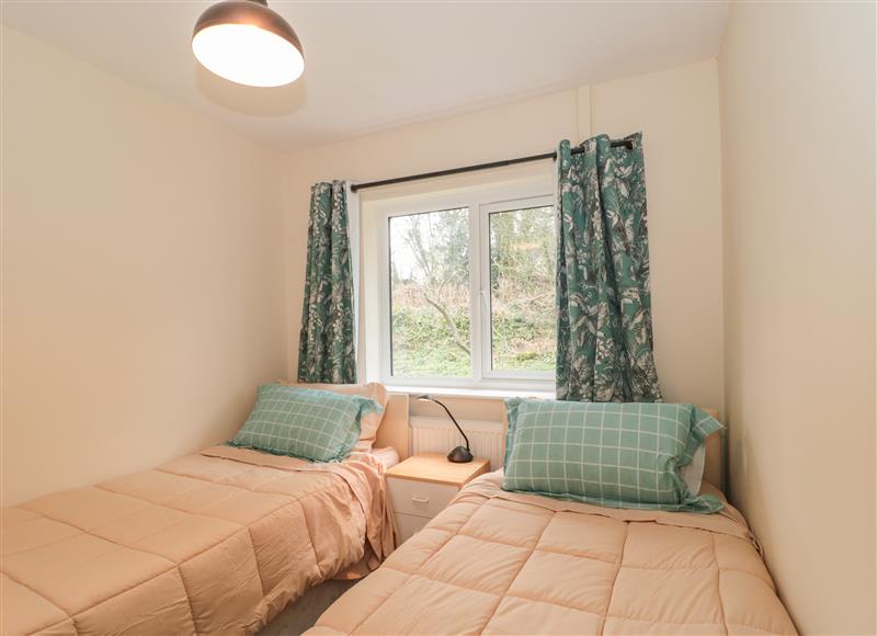 This is a bedroom (photo 3) at Broadlands Bungalow, Combe St Nicholas