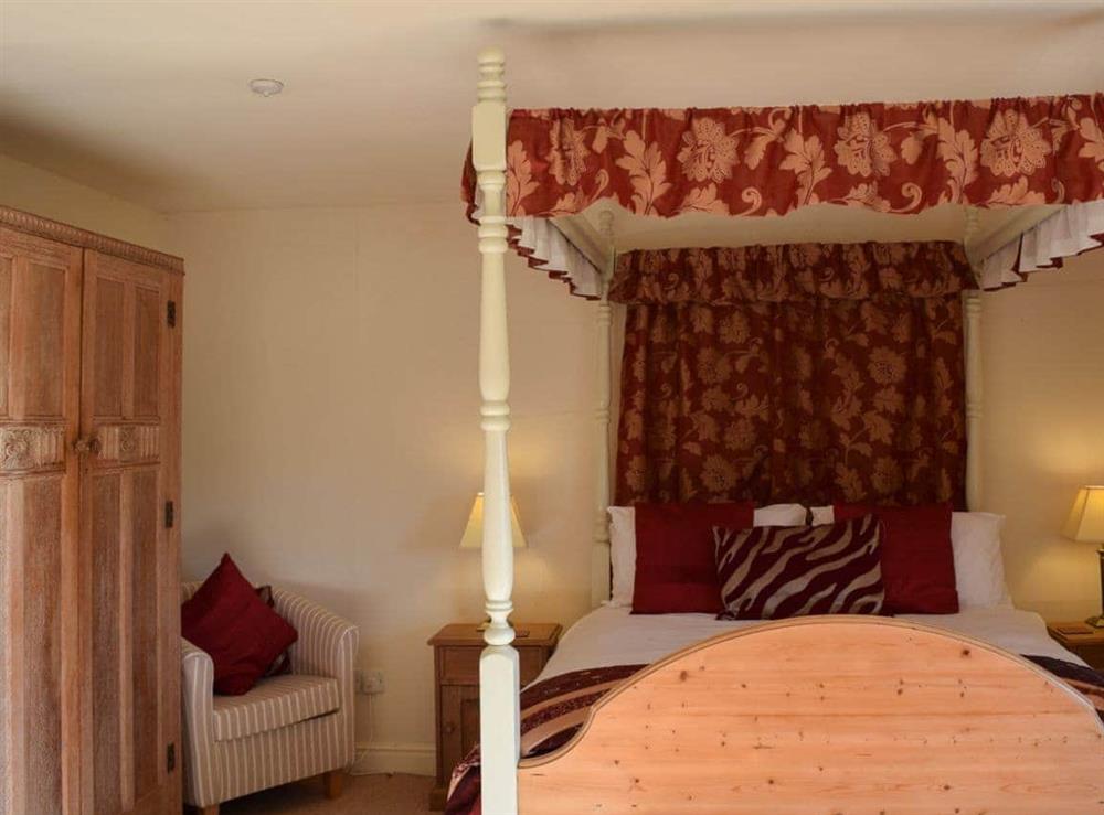 Large double bedroom with four poster bed at Broadmeadows Farm in Butterton, Staffordshire., Great Britain