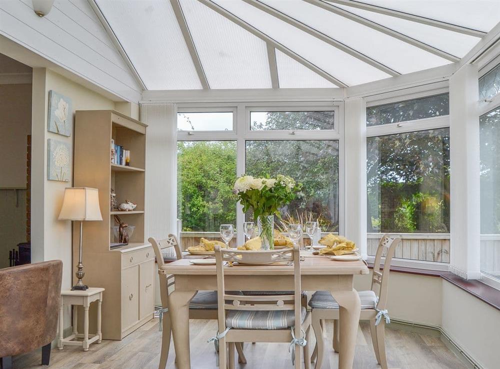Light and airy dining conservatory at Broadoak Barn in Ellesmere, Shropshire