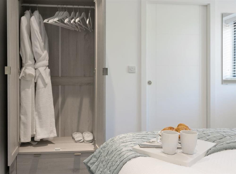 Complimentary bathrobes and slippers at The Retreat, 