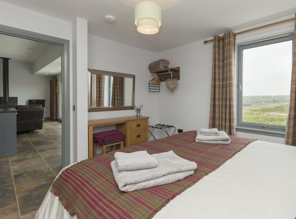 Relaxing double bedroom with dressing area at Storr, 