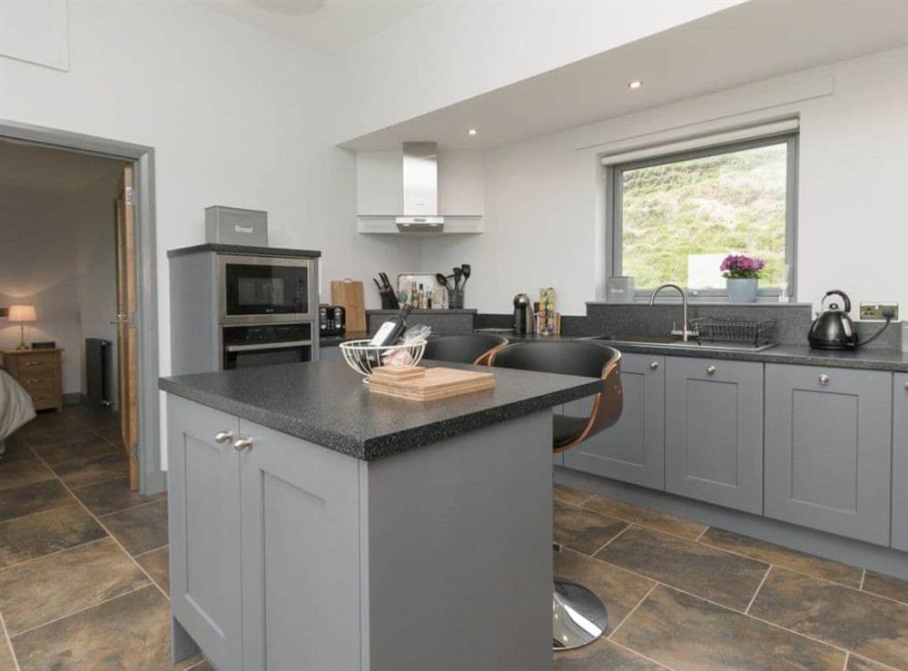 Well-equipped fitted kitchen at Storr, 