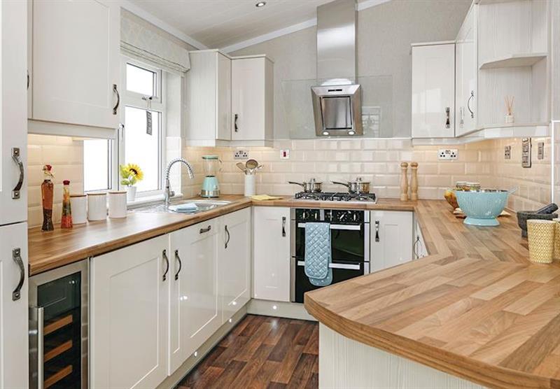 Kitchen in the Country Lodge Four VIP Platinum at Brokerswood Holiday Park in Southwick, Wiltshire