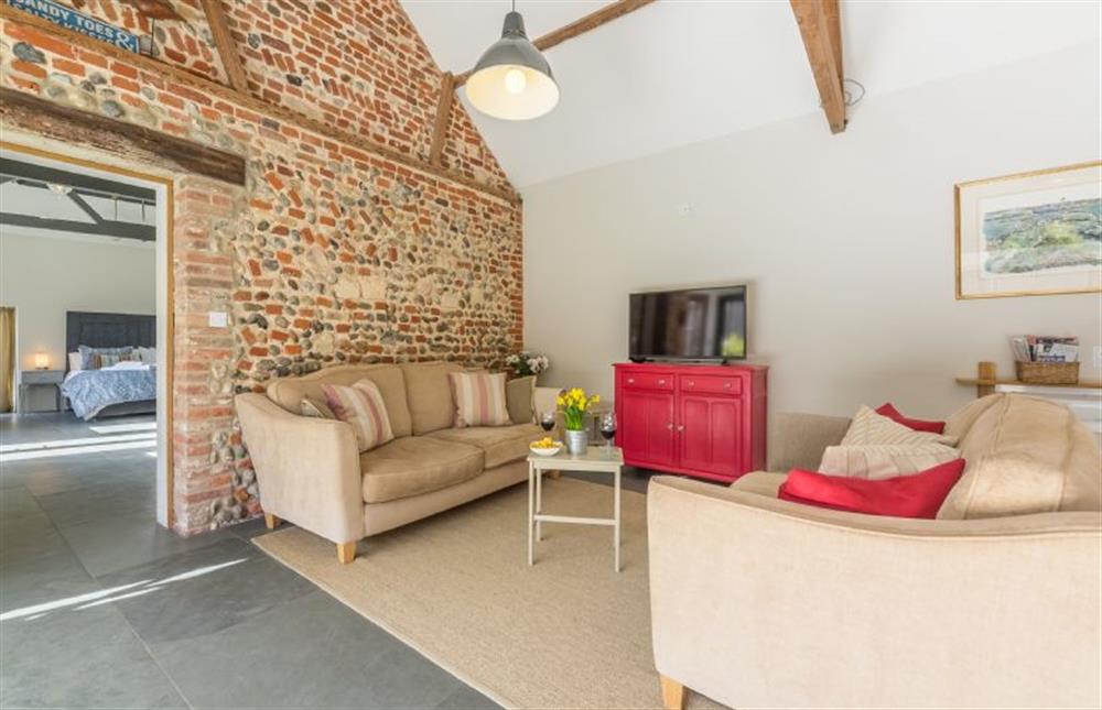 Ground floor:  Sitting area with view to master bedroom at Bromholm Barn, Ridlington near Norwich