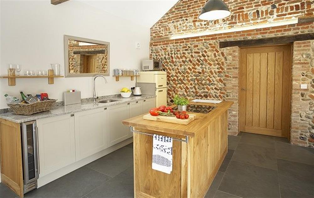 Ground floor:  Spacious, open plan kitchen/sitting and dining area at Bromholm Barn, Ridlington