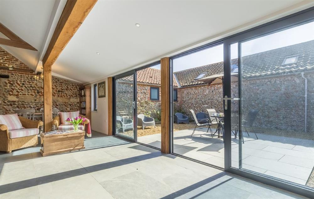 Spacious, open plan kitchen/sitting and dining area. (photo 10) at Bromholm Barn, Ridlington