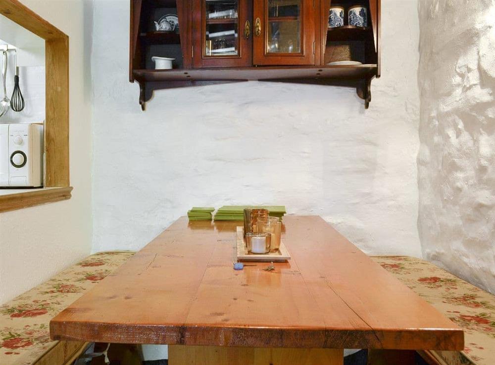 Convenient dining area with hatchway to kitchen at Bron Elan in Dolwyddelan, near Betws-y-Coed, Gwynedd