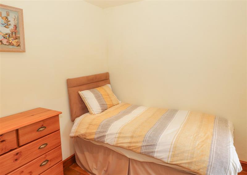 A bedroom in Bron Gadair at Bron Gadair, Newborough