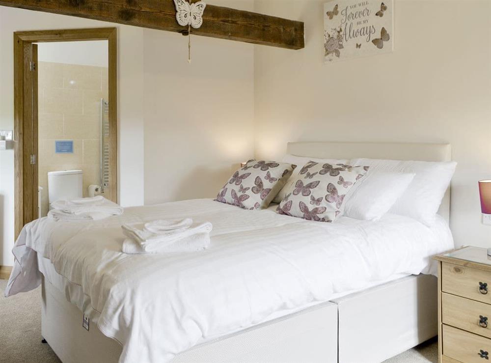 Exposed wood beams in second double bedroom at Llofft Storws, 